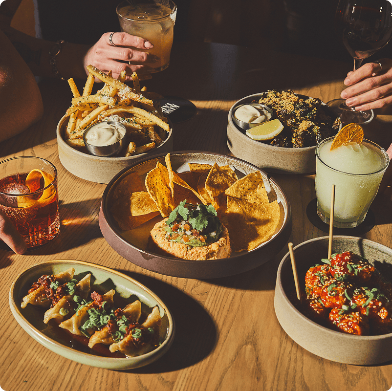 Shareable plates and cocktails for happy hour